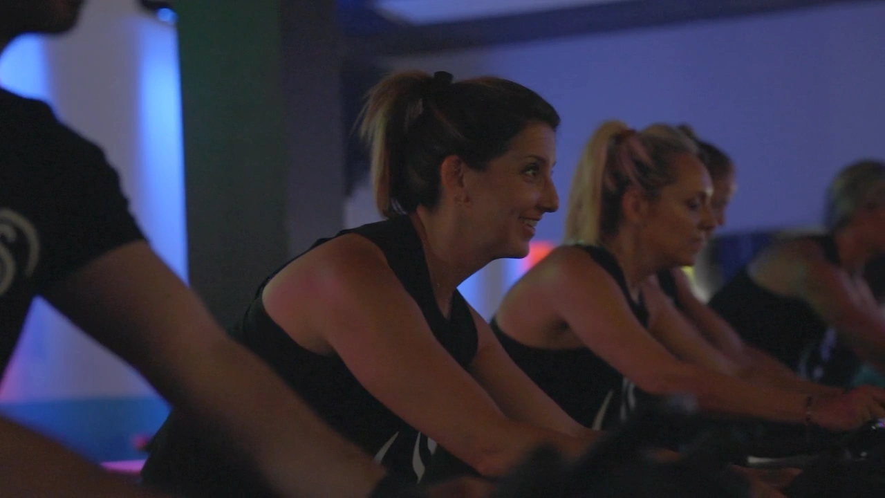 Riders cycling together at Studio Spin.