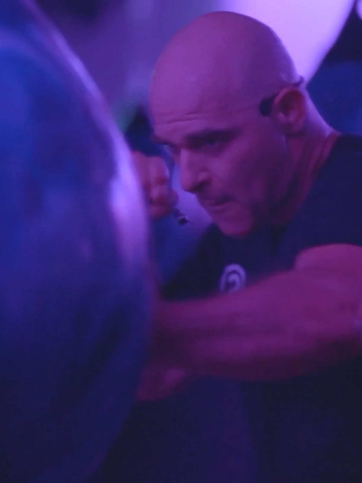 A Studio Spin member striking an AquaBag during RUMBLE.