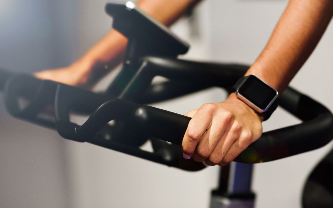 A woman in a spin class.