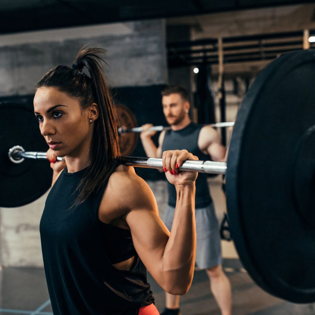 A woman in a class for strength training.